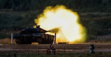 A T-72 B3 tank operated by a crew from Vietnam fires during the Tank Biathlon competition at the International Army Games 2022 in Alabino, outside Moscow, Russia, Aug. 16, 2022. (Reuters Photo)