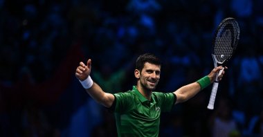 Serbia's Novak Djokovic celebrates after winning his men's single final match against Norway's Casper Ruud at the ATP Finals tennis tournament, Turin, Italy, Nov. 20, 2022. (AFP Photo)