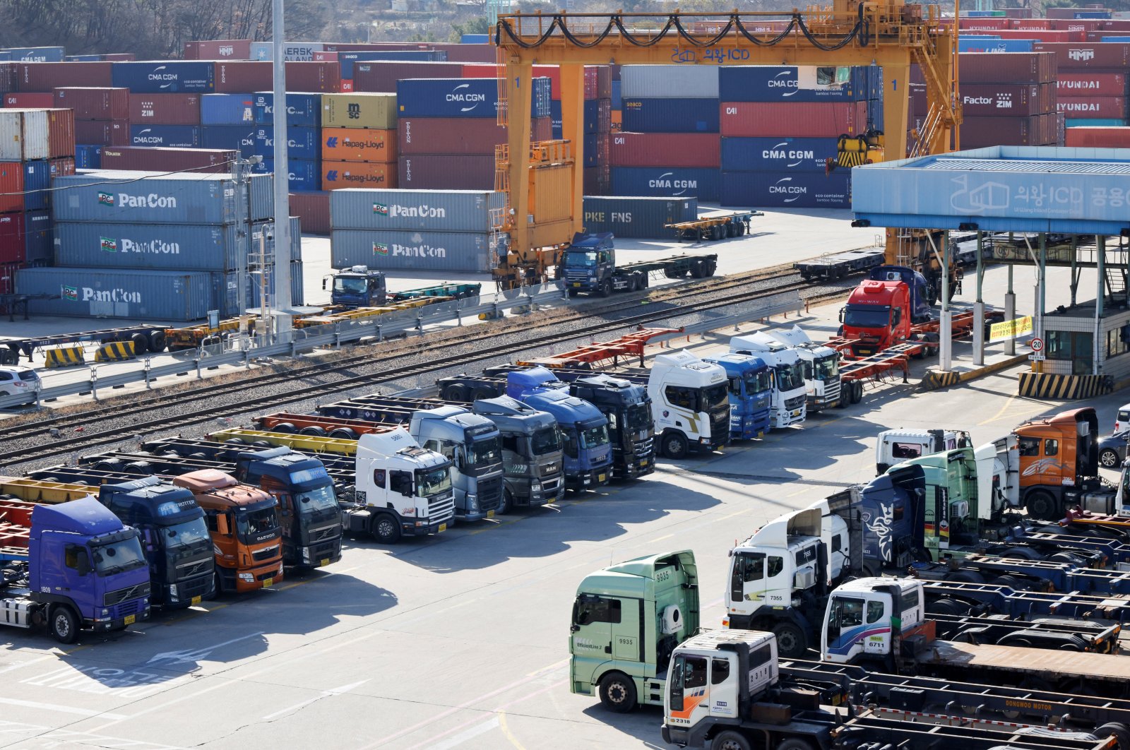 Trucks are parked at a terminal of the Inland Container Depot in Uiwang, South Korea, Nov. 30, 2022. (Reuters Photo)