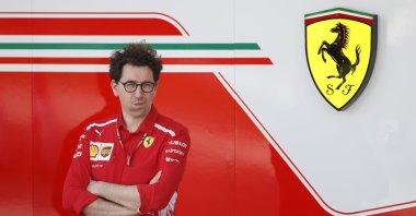 Former Ferrari Formula 1 boss standing in front of the Ferrari logo. (EPA Photo)