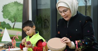First lady Emine Erdoğan checks recycled materials made at the center, in the capital Ankara, Türkiye, Dec. 8, 2022. (DHA Photo)