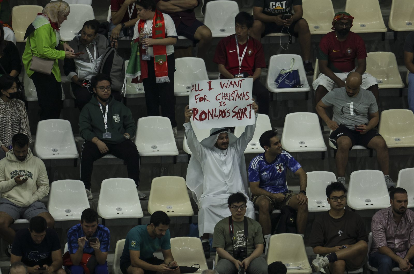 A fan of Cristiano Ronaldo holds a sign during the FIFA World Cup Qatar 2022 Round of 16 match between Portugal and Switzerland at Lusail Stadium, Lusail City, Qatar, Dec. 6, 2022. (Getty Images Photo)