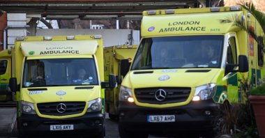 NHS ambulances and staff outside a hospital in London, Britain, Dec. 7, 2022. (EPA Photo)