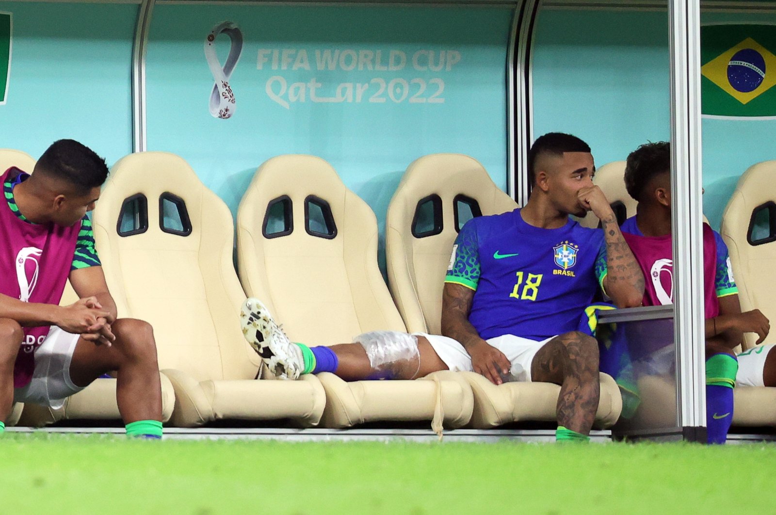 Casemiro (L) of Brazil looks at the leg of his teammate Gabriel Jesus (C) during the FIFA World Cup 2022 Group G football match between Cameroon and Brazil at Lusail Stadium, Lusail, Qatar, Dec. 2, 2022. (EPA Photo)