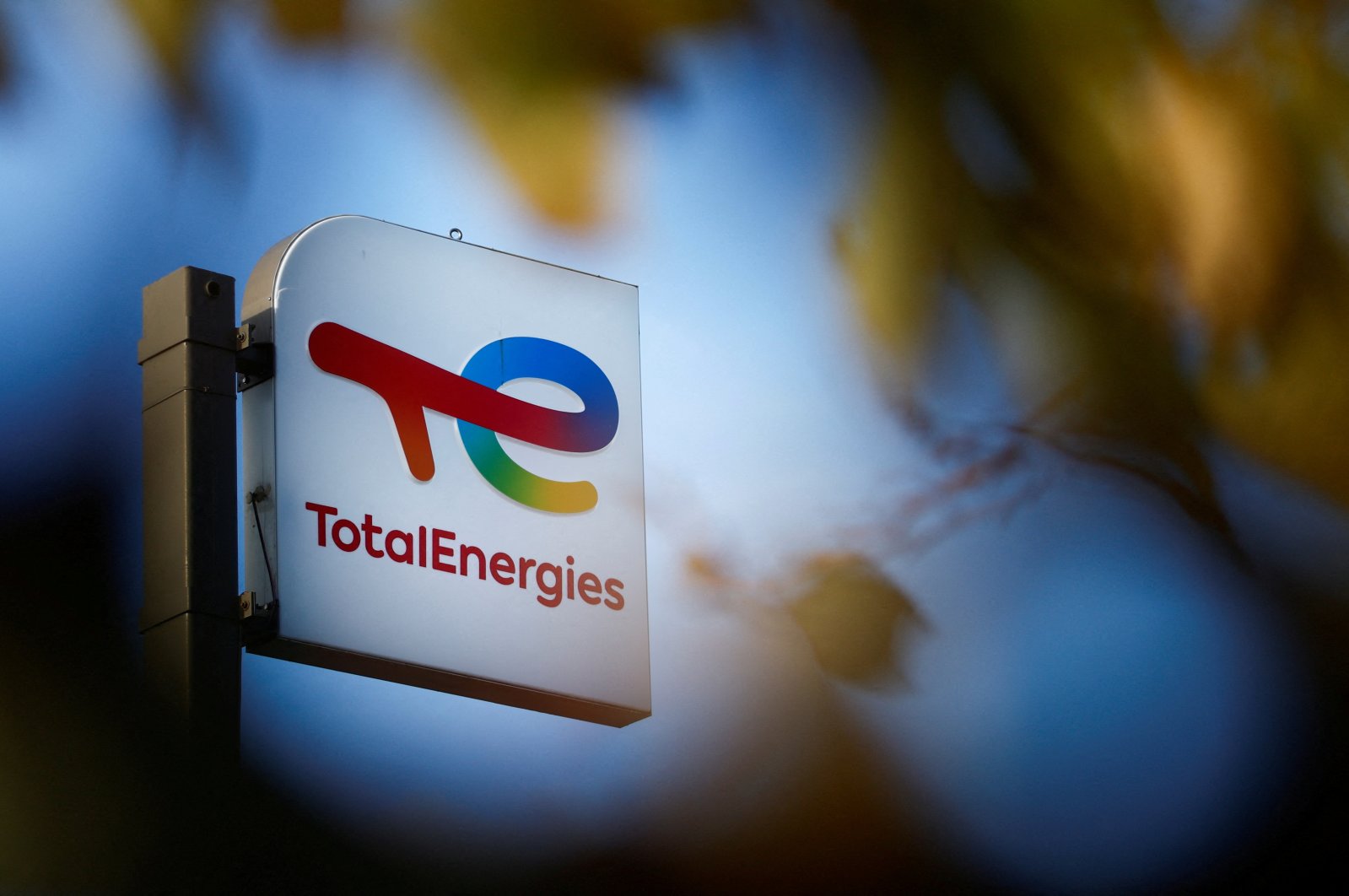 A sign with the logo of French oil and gas company TotalEnergies is pictured at a petrol station in Bouguenais near Nantes, France, Nov. 14, 2022. (Reuters Photo)