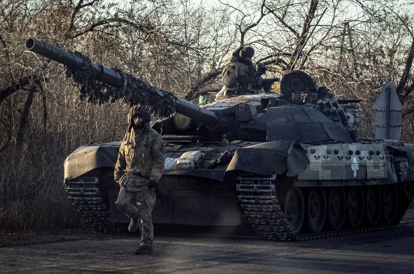 A Ukrainian officer walks near a tank in Bakhmut, as Russia&#039;s attack on Ukraine continues, Donetsk region, Ukraine, Dec. 5, 2022. (Reuters Photo)