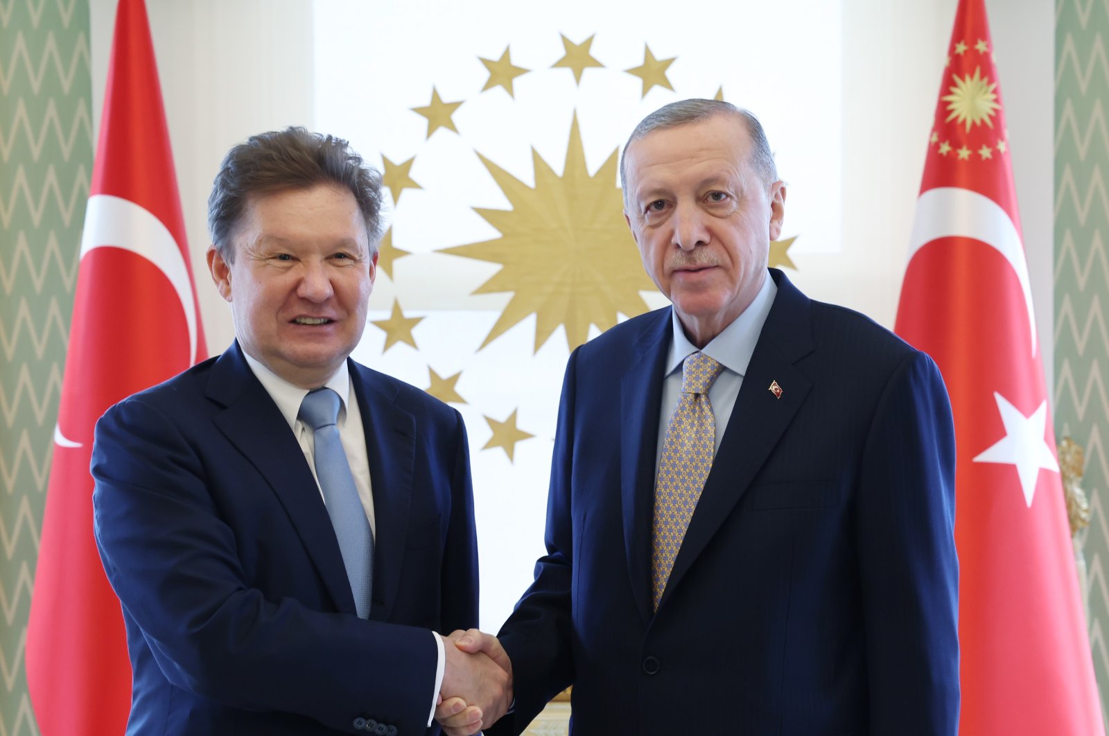 President Recep Tayyip Erdoğan shakes hands with the head of Gazprom Alexei Miller in Istanbul, Türkiye, Dec. 9, 2022. (AA Photo)