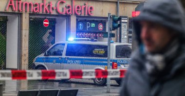 A police car outside a shopping center in Dresden, Germany, 10 December 2022. (EPA Photo)