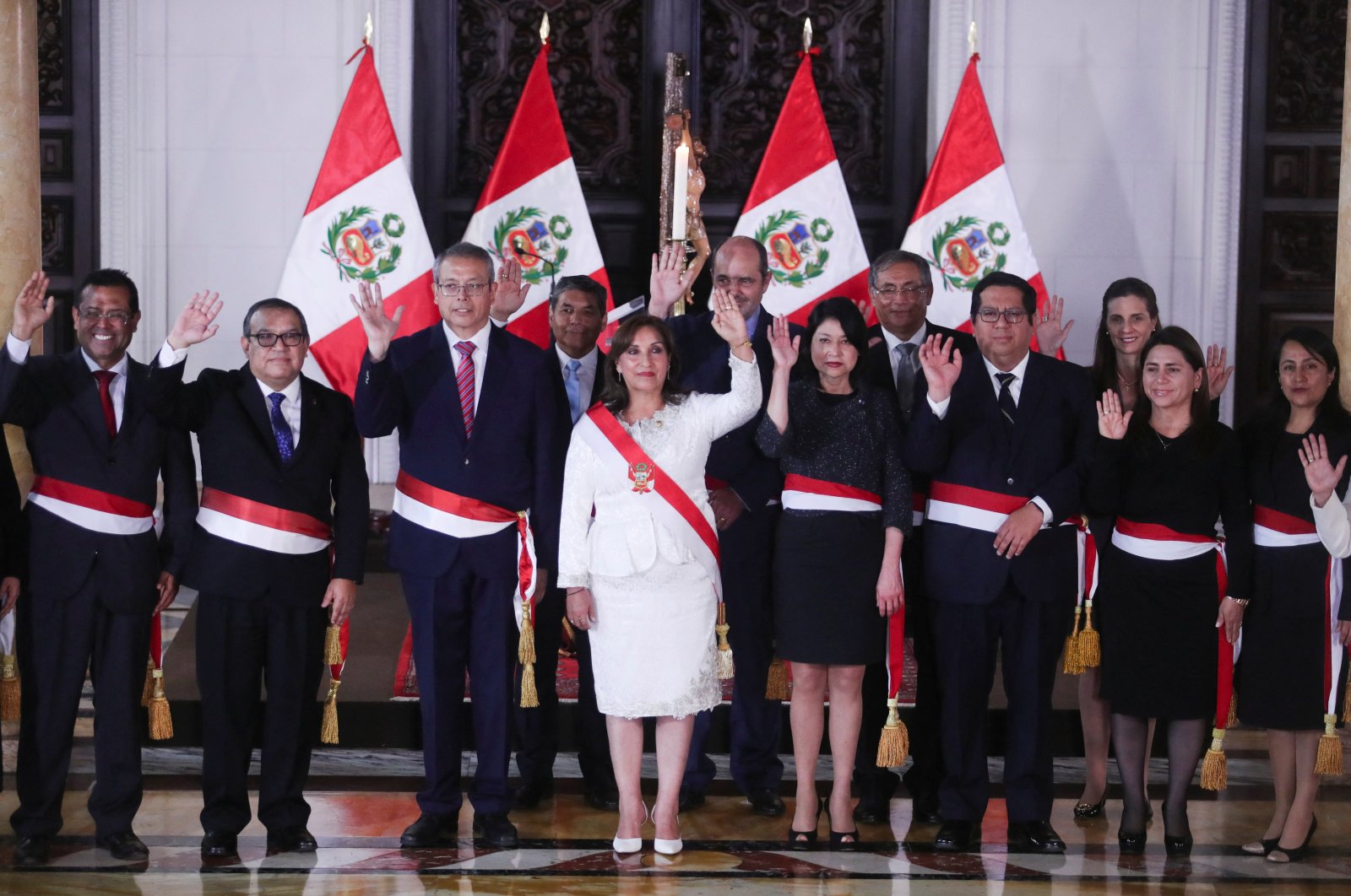 Peru&#039;s President Dina Boluarte (C), poses for a family photo along with members of her cabinet in Lima, Peru, Dec. 10, 2022. (Reuters Photo)