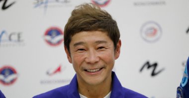 Space flight participant, Japanese billionaire Yusaku Maezawa attends a press conference ahead of the expedition to the International Space Station, in Star City outside Moscow, Russia, Oct. 14, 2021. (AFP Photo)