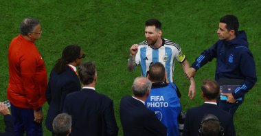 Argentina's Lionel Messi clashes with Netherlands coach Louis van Gaal and assistant coach Edgar Davids after the Argentina versus the Netherlands penalty shootout at the Lusail Stadium, Lusail, Qatar, Dec. 10, 2022. (Reuters Photo)