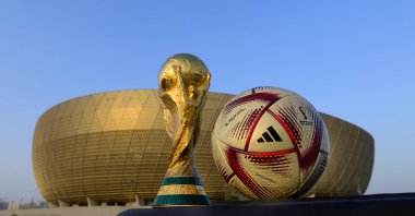 The FIFA World Cup Trophy and the official Adidas Al Hilm tournament ball at the Lusail Stadium, Lusail, Qatar. (FIFA Photo)