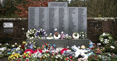 Floral tributes to the Lockerbie victims are seen at the Memorial Garden in Dryfesdale Cemetery, Lockerbie, Scotland, Dec. 21, 2018. (Reuters Photo)
