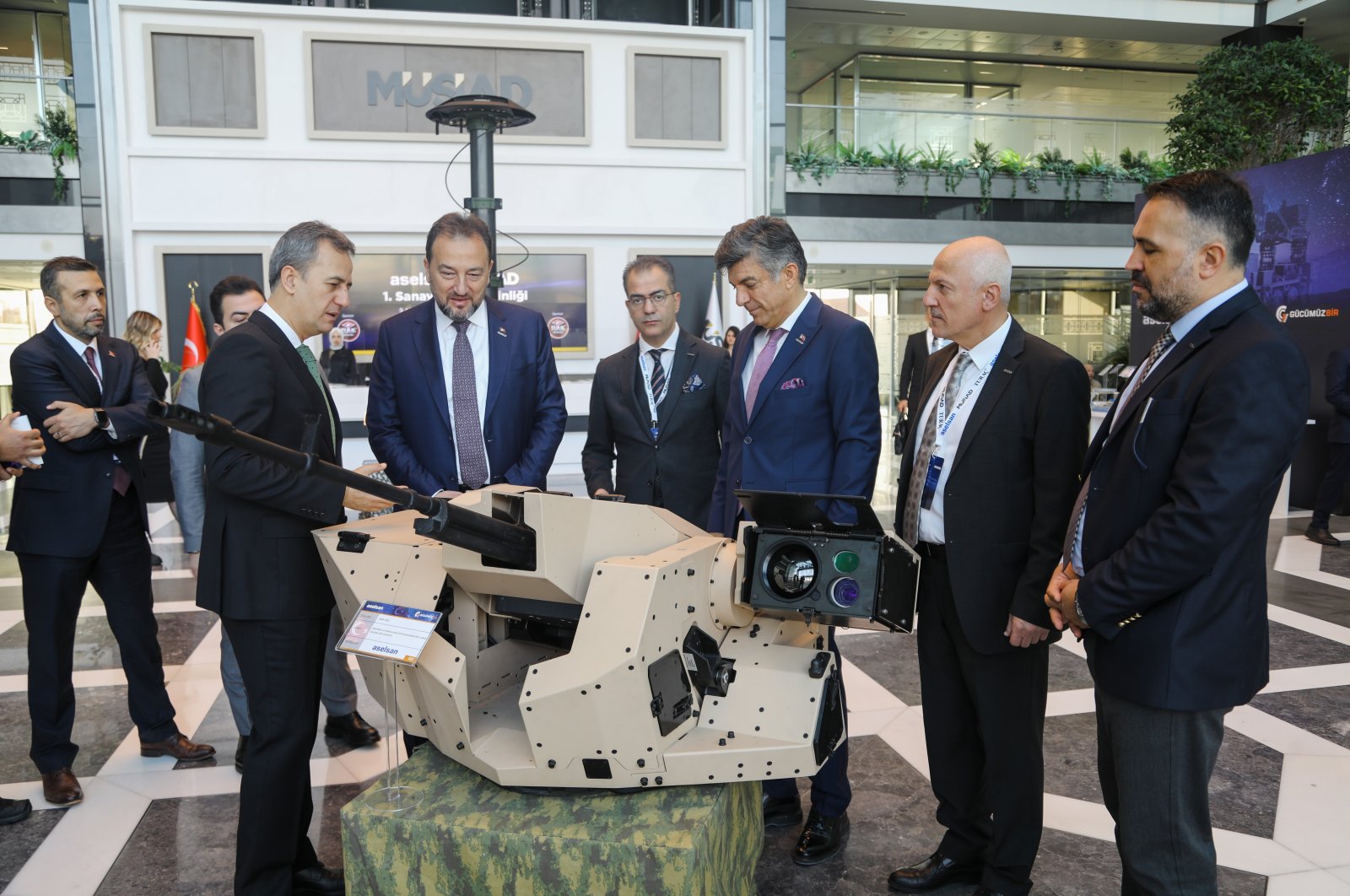Aselsan and MÜSIAD officials inspect a defense product produced by Aselsan and suppliers in MÜSIAD headquarters, Istanbul, Türkiye, Dec. 9, 2022. (Courtesy of MÜSIAD)