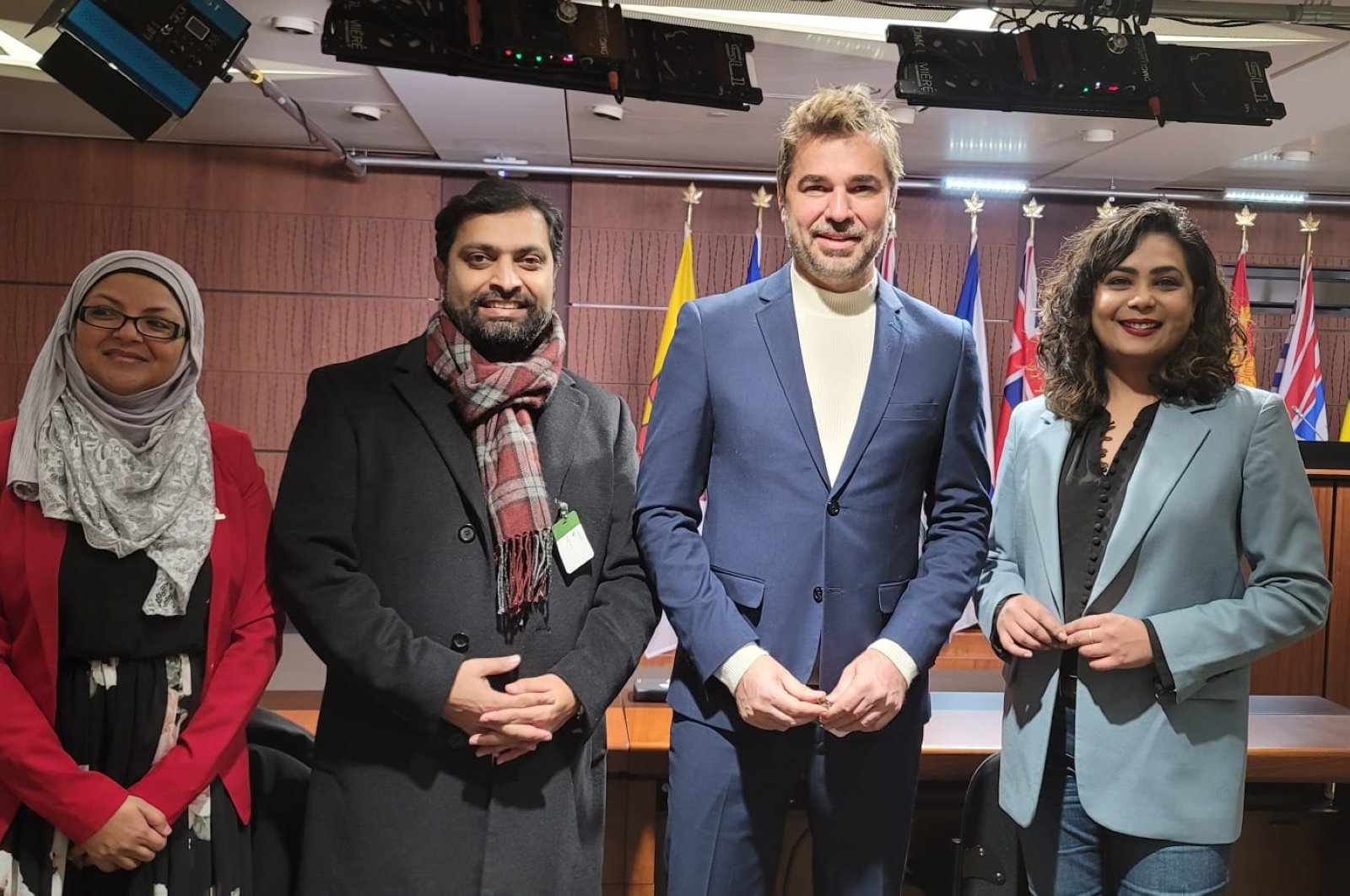 Engin Altan Düzyatan (2nd R) became the face of the clean drinking water campaign launched for communities that cannot access clean water around the world, Toronto, Canada, Dec. 10, 2022. (AA Photo)