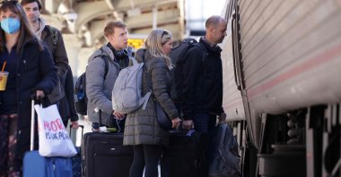 Passengers board their train at Union Station in Washington, D.C., U.S., Nov. 22, 2022. (AFP Photo)