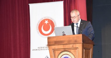 TTK President Birol Çetin speaks at the panel entitled “Greek Uprising and Terror: Tripolitsa Massacre” in Ankara, Dec. 12, 2022. (AA Photo)