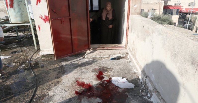 Palestinians inspect the area where a girl was killed in the West Bank city of Jenin, occupied Palestine, Dec. 12, 2022. (EPA Photo)