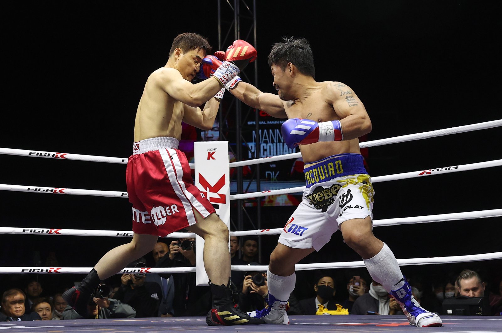 Philippine&#039;s Manny Pacquiao (R) in action with South Korean mixed martial artist DK Yoo during their exhibition match, Goyang, Seoul, South Korea, Dec. 11, 2022. (EPA Photo)