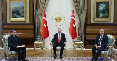 President Recep Tayyip Erdoğan is seen together with Foreign Minister Mevlüt Çavuşoğlu and his Turkmen counterpart Rashid Meredov. are seen at the presidential palace, Ankara, Türkiye, Nov. 28, 2022. (AA Photo)