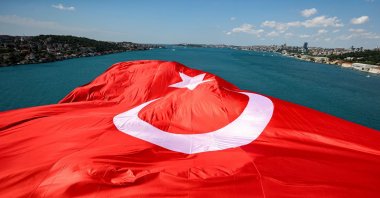 The July 15 Association and Istanbul governorate flew the Turkish flag on a bridge in Istanbul, Türkiye, July 12, 2022. (AA Photo)