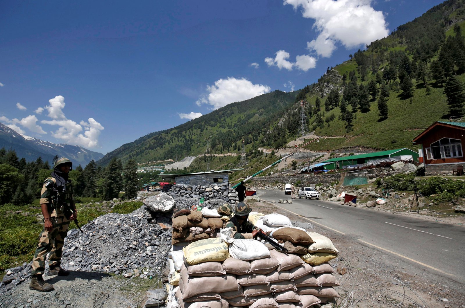 India&#039;s Border Security Force (BSF) soldiers stand guard at a checkpoint along a highway leading to Ladakh, India, June 17, 2020. (Reuters Photo)