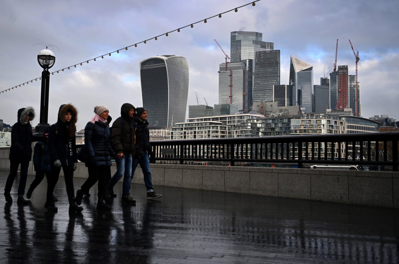 UK jobless rate edges up, but regular pay sees record gain