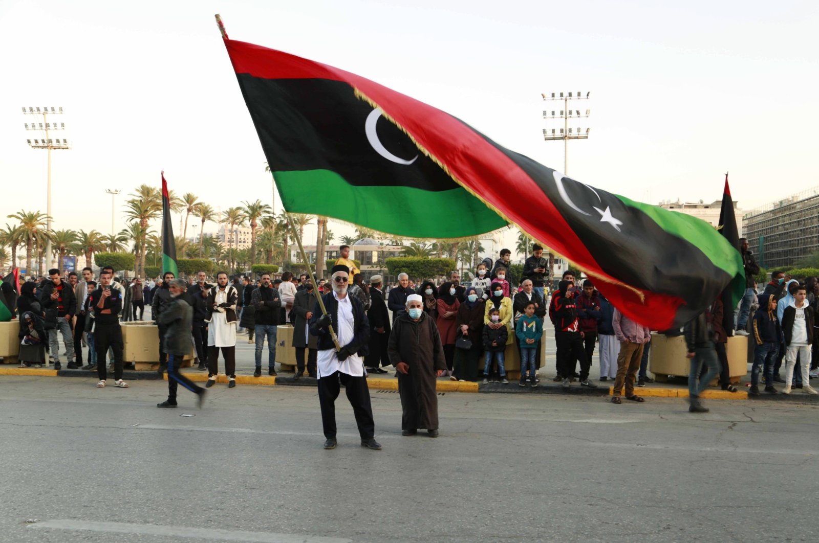 Libyans celebrate the 70th anniversary of their country&#039;s independence, despite widespread disappointment over the postponement of presidential elections, in Martyrs&#039; Square, Tripoli, Libya, Dec. 24, 2021. (AP Photo)