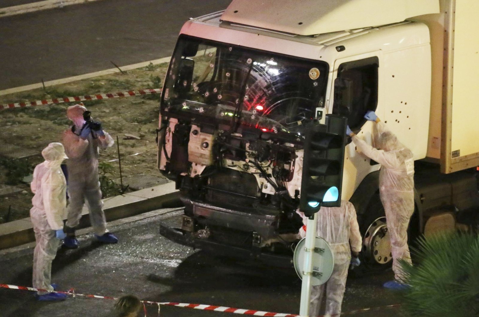 Authorities investigate a truck after it plowed through Bastille Day revelers in the French resort city of Nice, France on July 14, 2016. (AP File Photo)