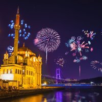 Fireworks go off around the Bosporus and Ortaköy Mosque, in Istanbul, Türkiye. (Shutterstock Photo)