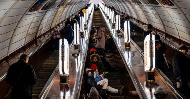 Civilians take shelter inside a metro station during an air raid alert, Kyiv, Ukraine, Dec. 13, 2022. (AFP Photo)