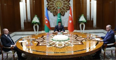 President Recep Tayyip Erdoğan (R) meeting with President of Turkmenistan Serdar Berdymukhamedov (C) and President of Azerbaijan Ilham Aliyev (L) during a trilateral summit in Awaza, Turkmenistan, Dec. 14, 2022. (Photo by Turkish Presidential Press Office via AFP)