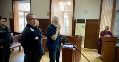 Levent Göktaş (C) appears before a court in Haskovo, Bulgaria, Nov. 28, 2022. (AA Photo) 