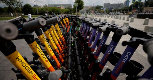 Electric scooters are parked at a station in Moscow, Russia, June 8, 2021. (Reuters Photo)