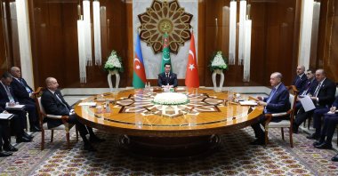 Azerbaijani President Ilham Aliyev (L), Turkmen President Serdar Berdimuhamedov (C) and President Recep Tayyip Erdoğan (R) attend a trilateral summit in Awaza, Turkmenistan, Dec. 14, 2022. (IHA Photo)