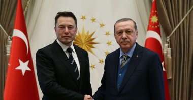 Tesla and SpaceX CEO Elon Musk (L) shakes hands with President Recep Tayyip Erdoğan during a visit to Ankara, Turkey, Nov. 8, 2017. (IHA Photo)