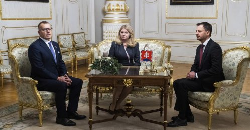 Slovakia's Prime Minister Eduard Heger (right) and House Chair Boris Kollar (left) meet Slovakia's President Zuzana Caputova, after Parliament where a vote expressed no-confidence in Heger's Government, at the Presidential Palace, in Bratislava, Thursday, Dec. 15, 2022. (AP Photo)