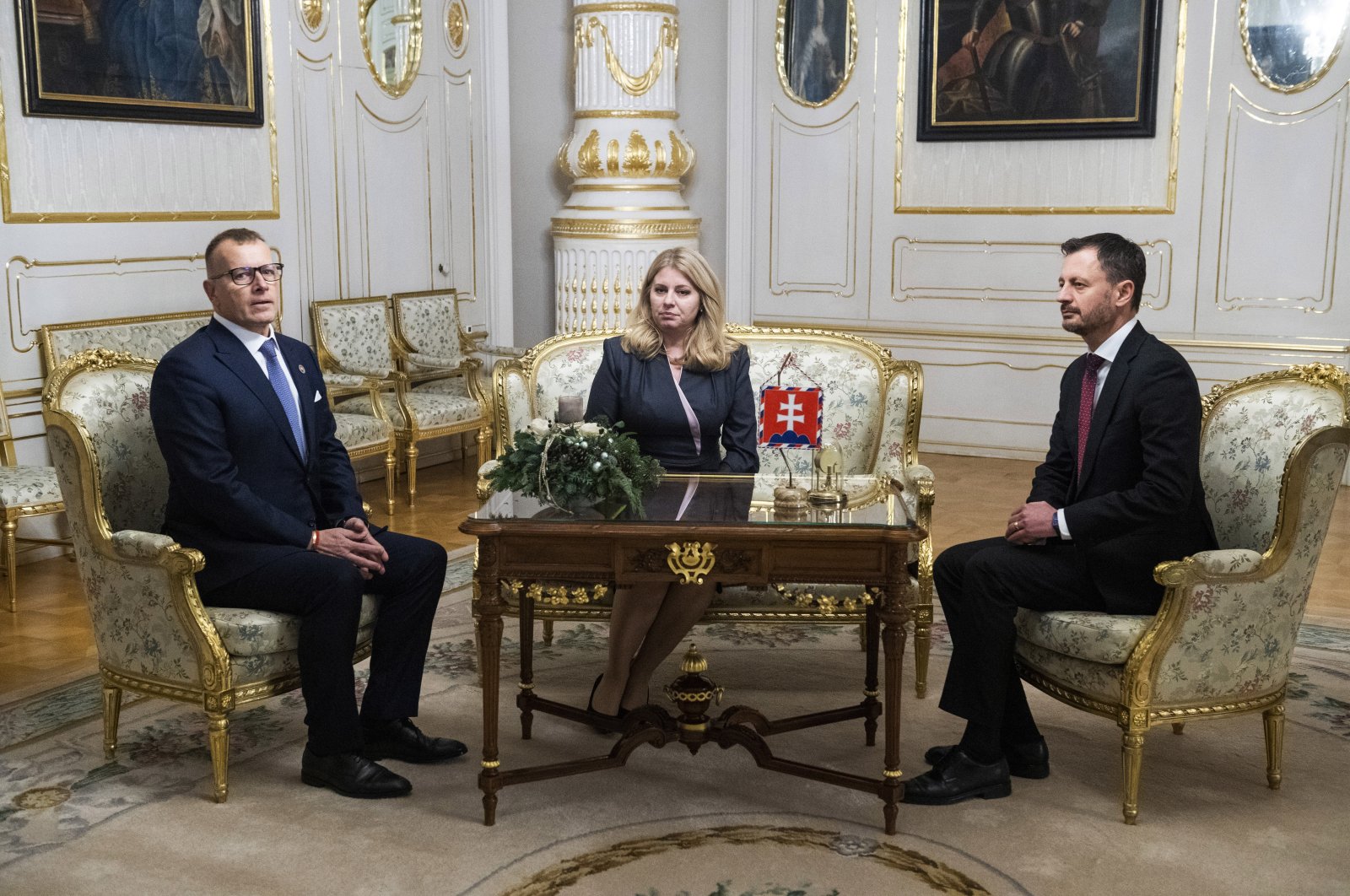 Slovakia&#039;s Prime Minister Eduard Heger (right) and House Chair Boris Kollar (left) meet Slovakia&#039;s President Zuzana Caputova, after Parliament where a vote expressed no-confidence in Heger&#039;s Government, at the Presidential Palace, in Bratislava, Thursday, Dec. 15, 2022. (AP Photo)