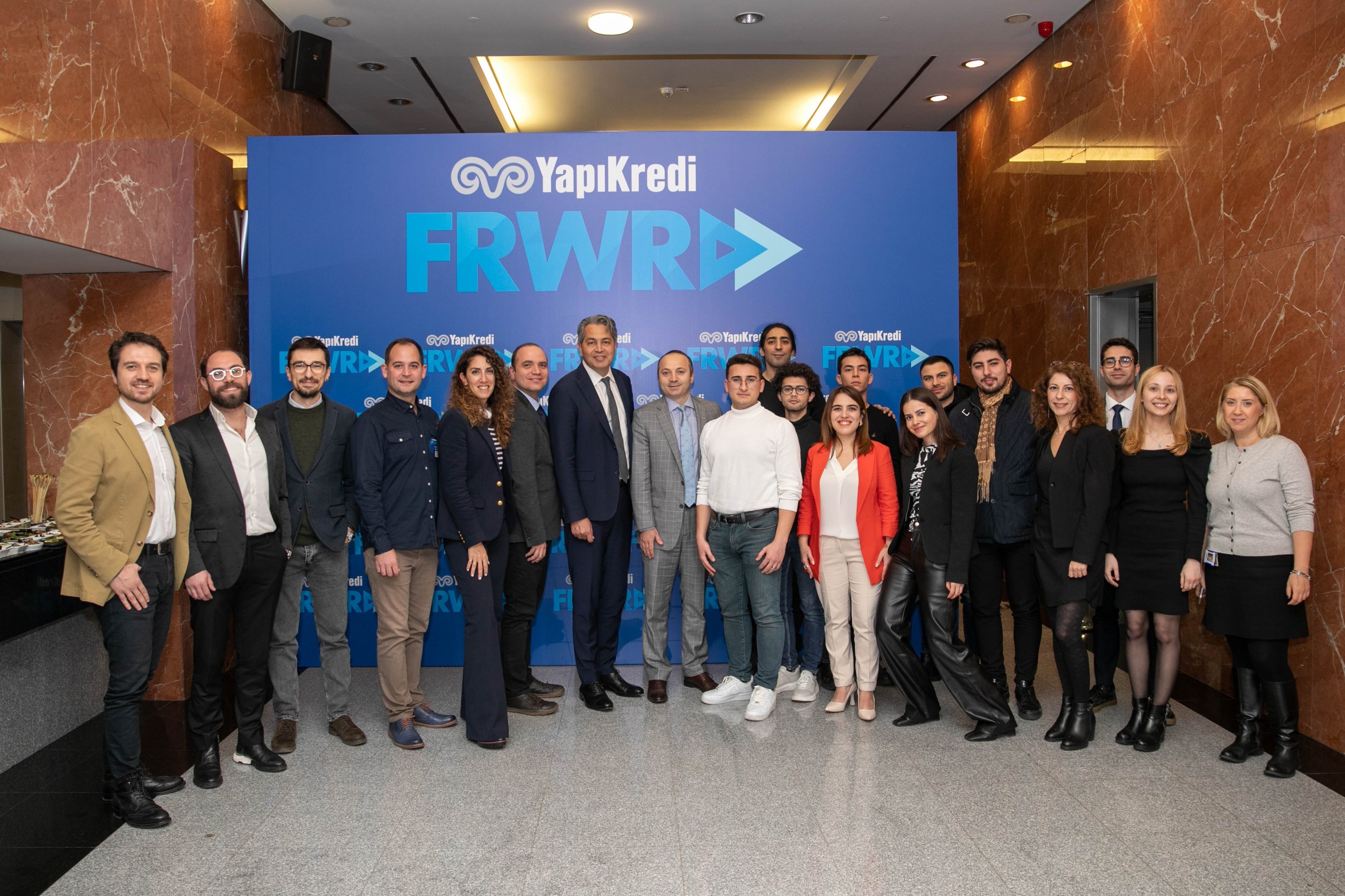 Officials and members of startups accepted to the Yapı Kredi Fast FRWRD program are seen during a demo day event in Istanbul, Türkiye, Dec. 14, 2022. (Courtesy of Yapı Kredi Fast FRWRD)