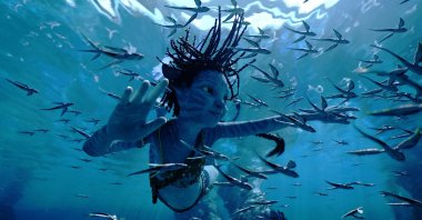 This image released by 20th Century Studios shows Trinity Bliss, as Tuk, in a scene from &quot;Avatar: The Way of Water.&quot; (AP Photo)
