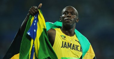 Usain Bolt of Jamaica celebrates after he wins gold in the final of the Men's 200m on Day 13 of the Rio 2016 Olympic Games at the Olympic Stadium. Rio de Janeiro, Brazil, Aug. 18, 2016 (Getty Images Photo)