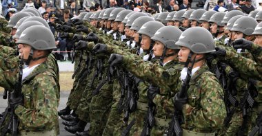 Japan Ground Self-Defense Forces taking part in a military review in Asaka, Saitama prefecture, Japan, Oct. 14, 2018. (AFP Photo)
