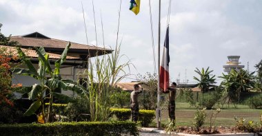 French soldiers for the logistics mission MISLOG-B lower the national flag at their base at Bangui airport, Central African Republic, Dec. 15, 2022. (AFP Photo)