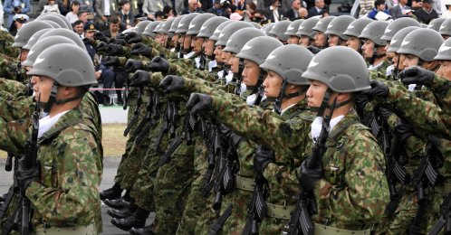 Japan Ground Self-Defense Forces taking part in a military review in Asaka, Saitama prefecture, Japan, Oct. 14, 2018. (AFP Photo)