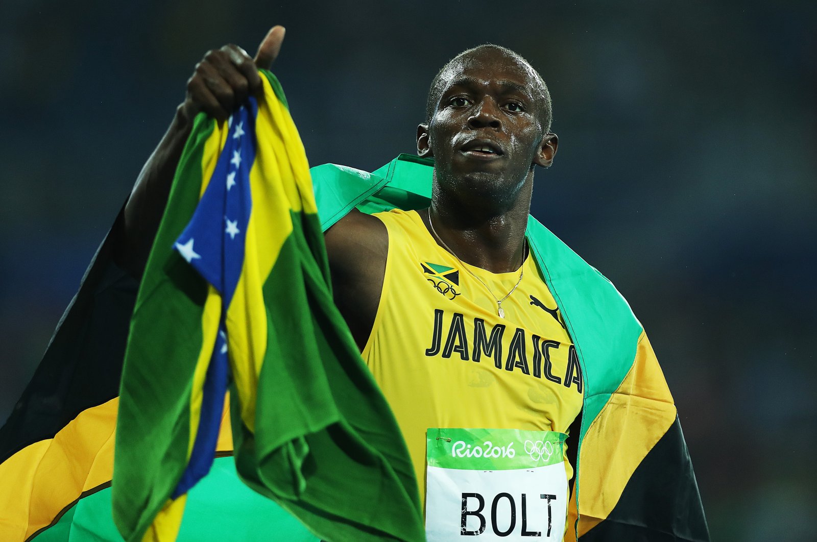 Usain Bolt of Jamaica celebrates after he wins gold in the final of the Men&#039;s 200m on Day 13 of the Rio 2016 Olympic Games at the Olympic Stadium. Rio de Janeiro, Brazil, Aug. 18, 2016 (Getty Images Photo)