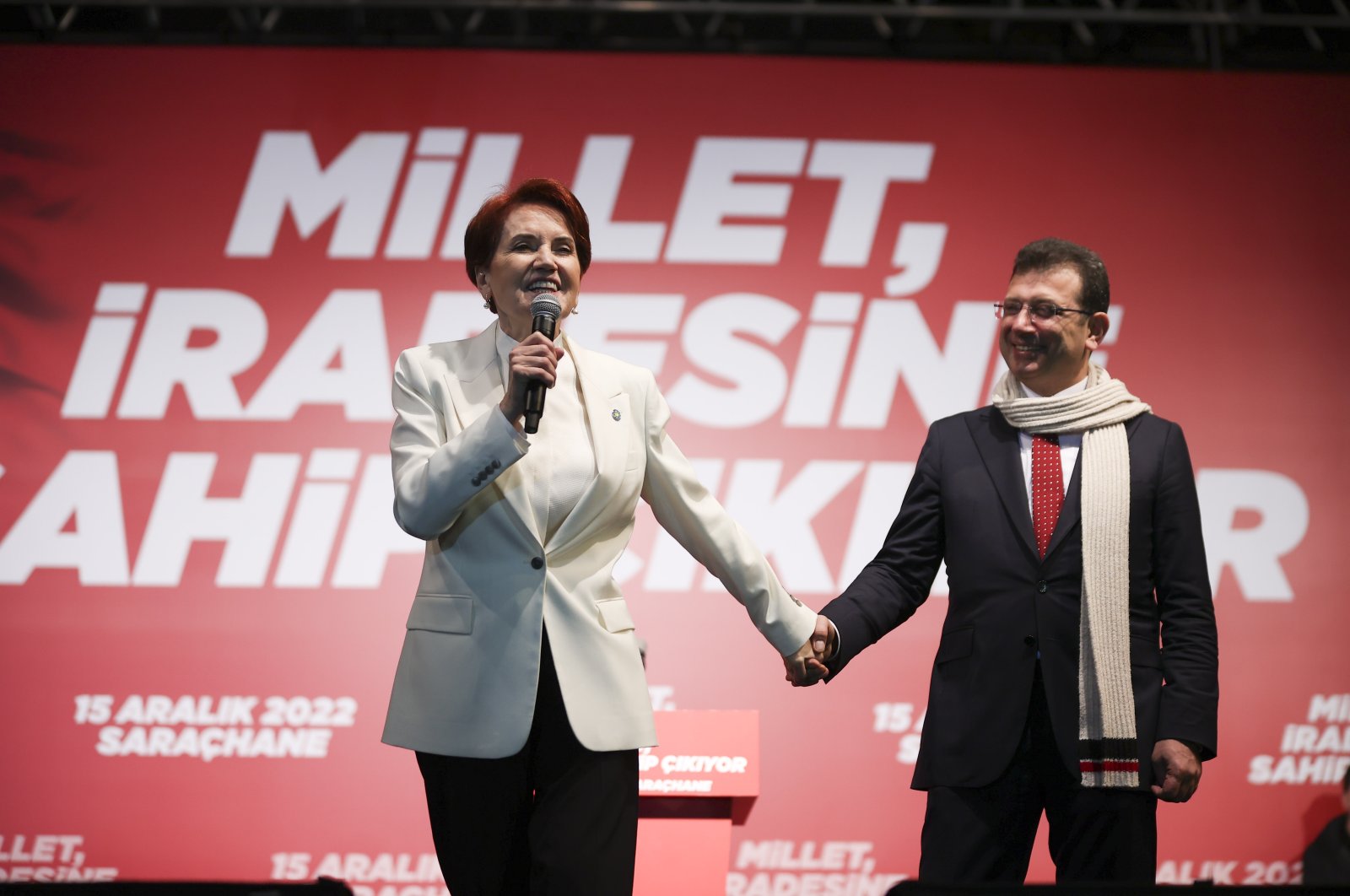 Turkish Good Party (IP) Chairperson Meral Akşener (L) and Istanbul Metropolitan Mayor Ekrem Imamoğlu (R) on stage at an opposition rally in Istanbul, Türkiye, Thursday, Dec. 15, 2022. (AA Photo)