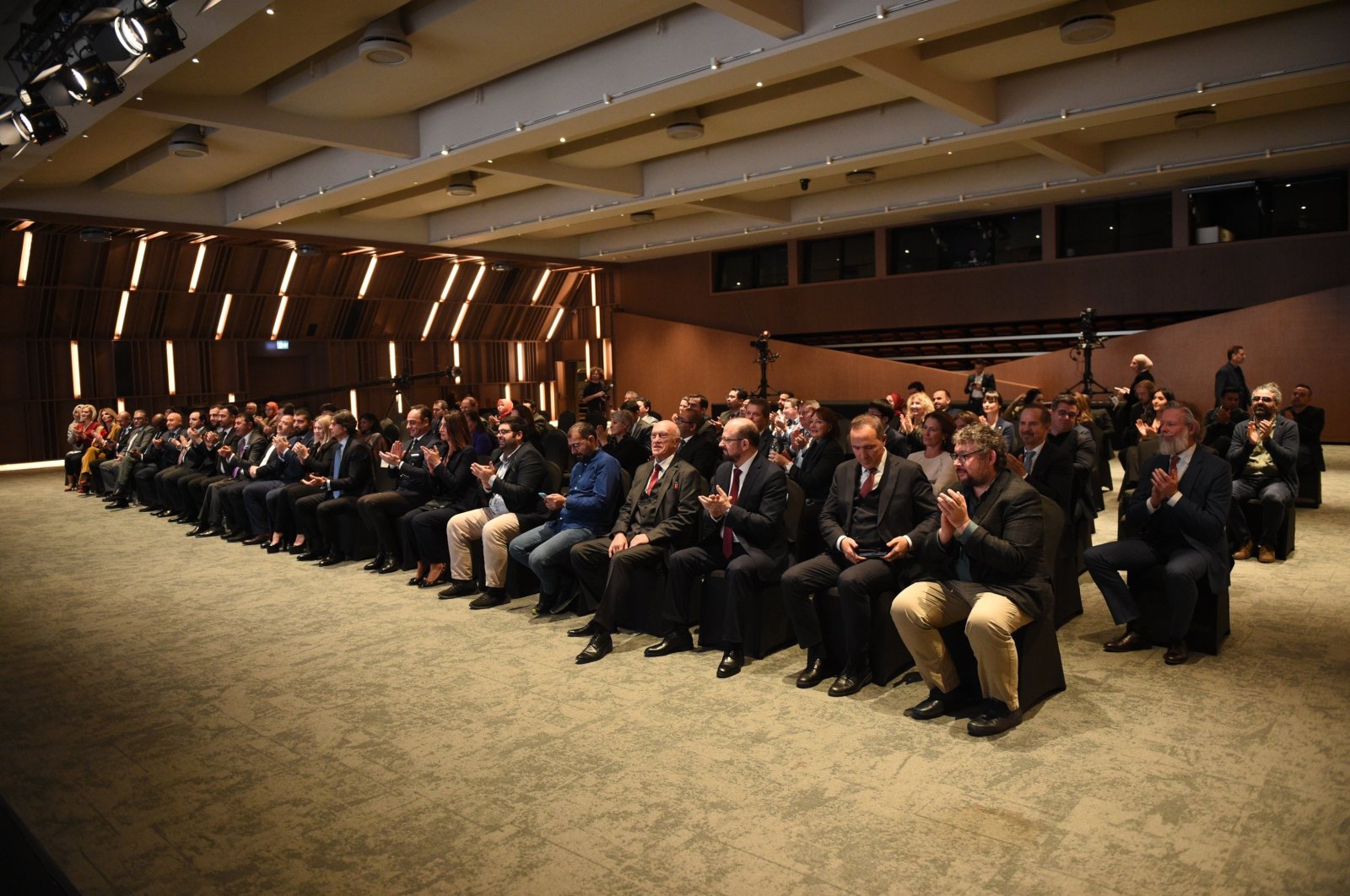 Diplomats, CEOs and media representatives attend the media and diplomacy event held in the Turkuvaz Media Center in Istanbul, Türkiye, Dec. 7, 2022.