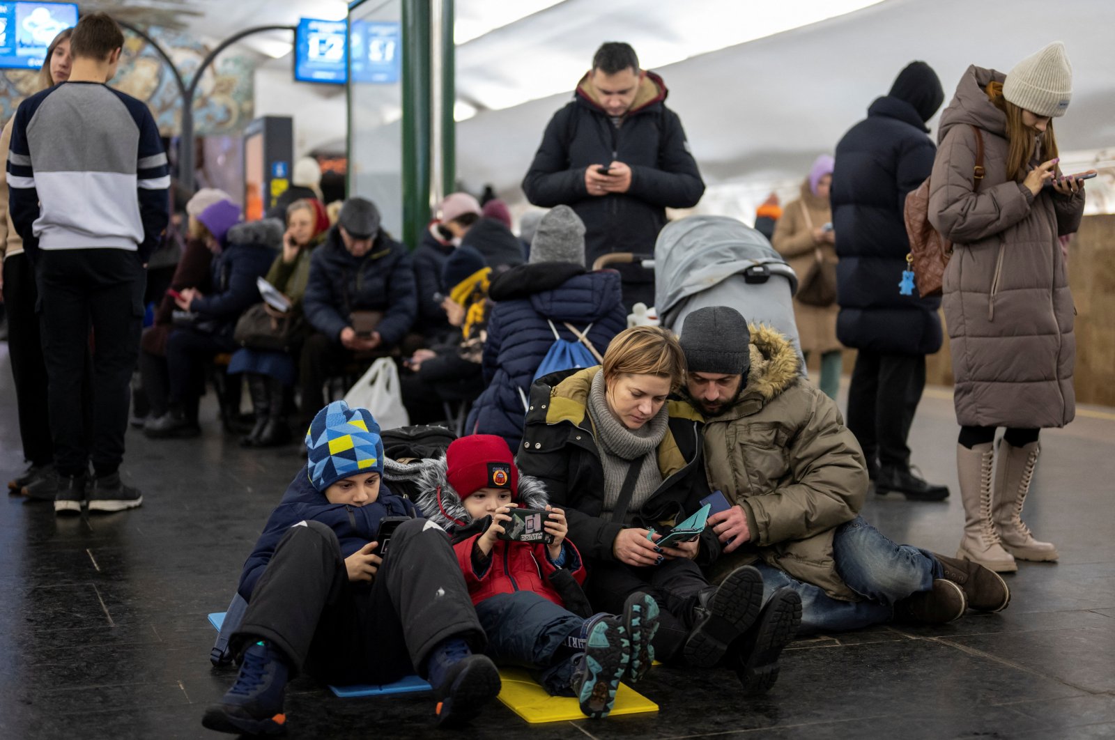 People shelter inside a metro station during massive Russian missile attacks in Kyiv, Ukraine, Dec. 16, 2022. (Reuters Photo)