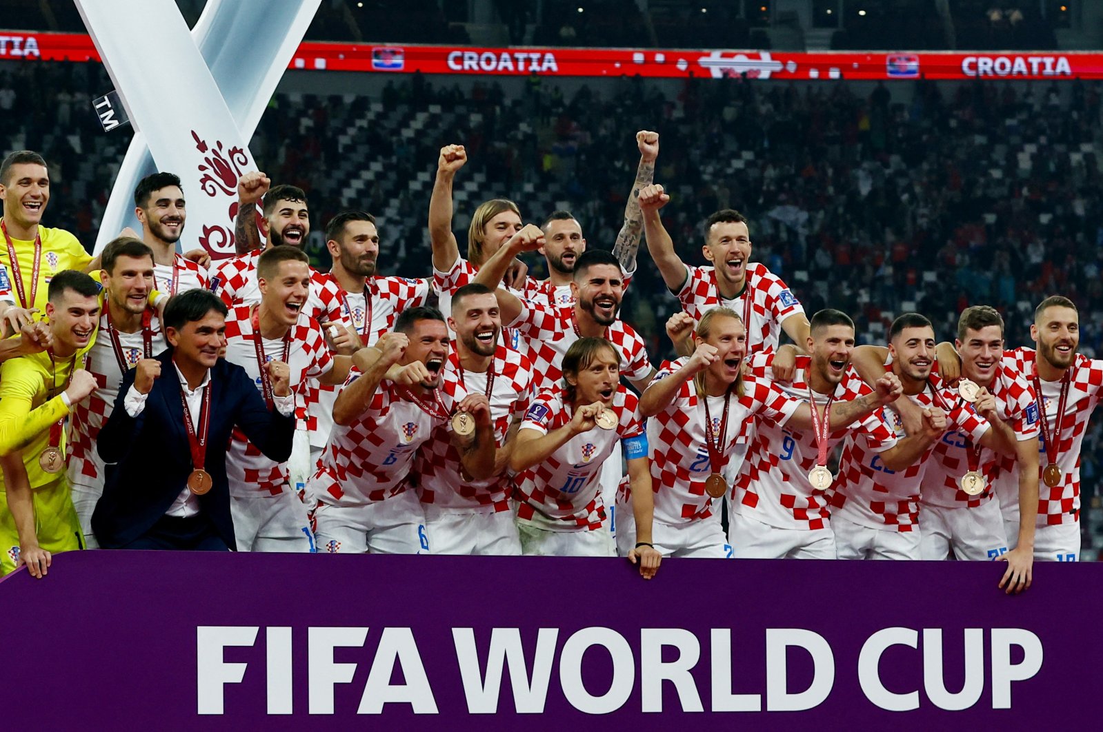 Croatia players celebrate on stage after FIFA World Cup Qatar 2022 Third-Place Playoff match between Croatia and Morocco, at the Khalifa International Stadium, in Doha, Qatar, Dec. 17, 2022. (Reuters Photo)