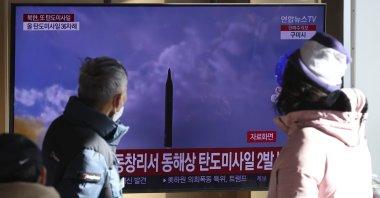 People watch a TV screen showing a news program about North Korea's missile launch, Seoul, South Korea, Dec. 18, 2022. (AP Photo)